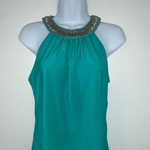 Caché teal, sleeveless top w/ silver embellishments at the neck. Size M.